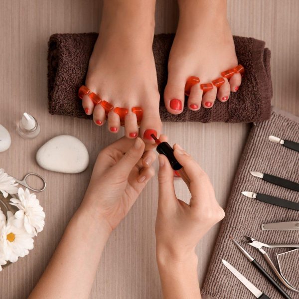 HAnds Feet rcb8dwzu4he0d391fh3jjtgih1agj53n52pq1qhjzk Young woman getting professional pedicure in beauty salon